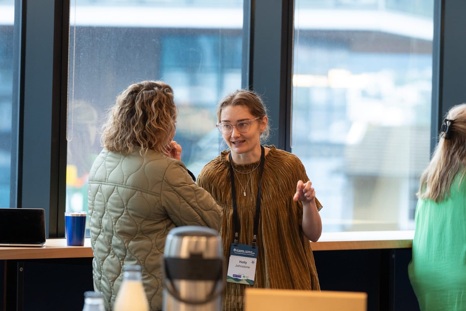 Two people in conversation at a working session, talking something through